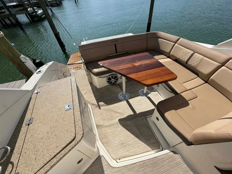 Slide: The Image of 2016 Sea Ray Sundancer 350, comfortable seating area by the water. - 38