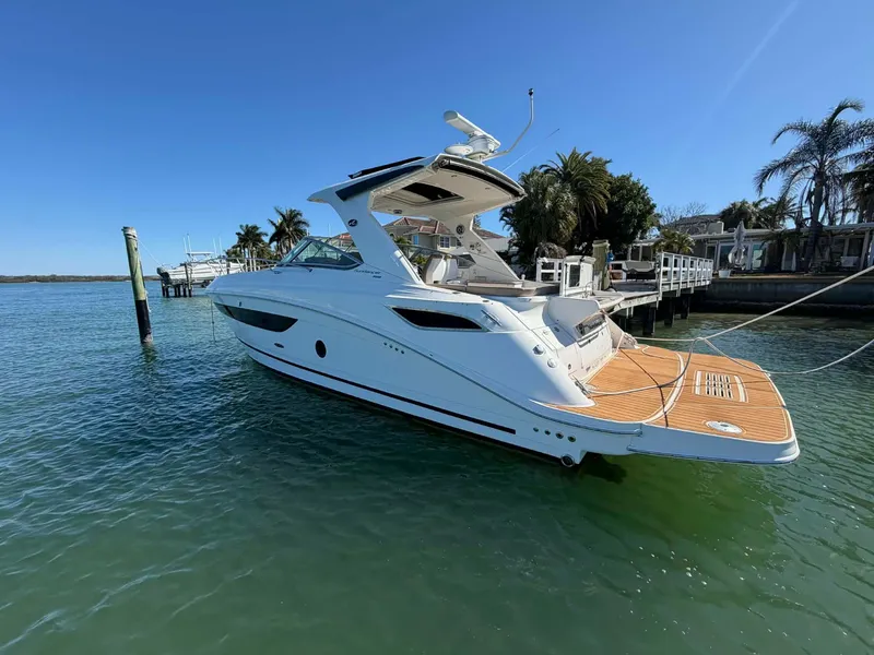 Slide: The Image of 2016 Sea Ray Sundancer 350 yacht docked on a sunny day. - 4
