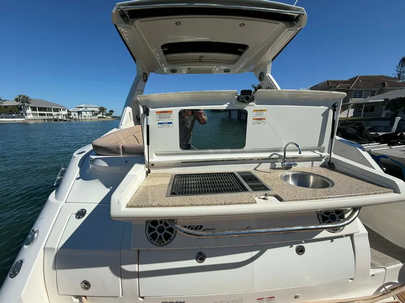 Slide: The Image of Sea Ray Sundancer 350 boat kitchen with sink and grill, 2016 model. - 43