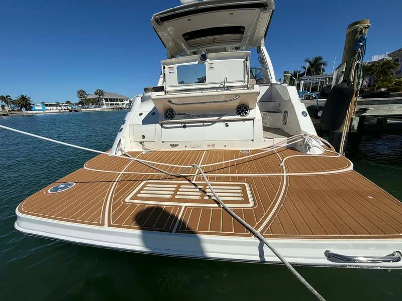 Slide: The Image of Rear view of a 2016 Sea Ray Sundancer 350 yacht in harbor. - 44