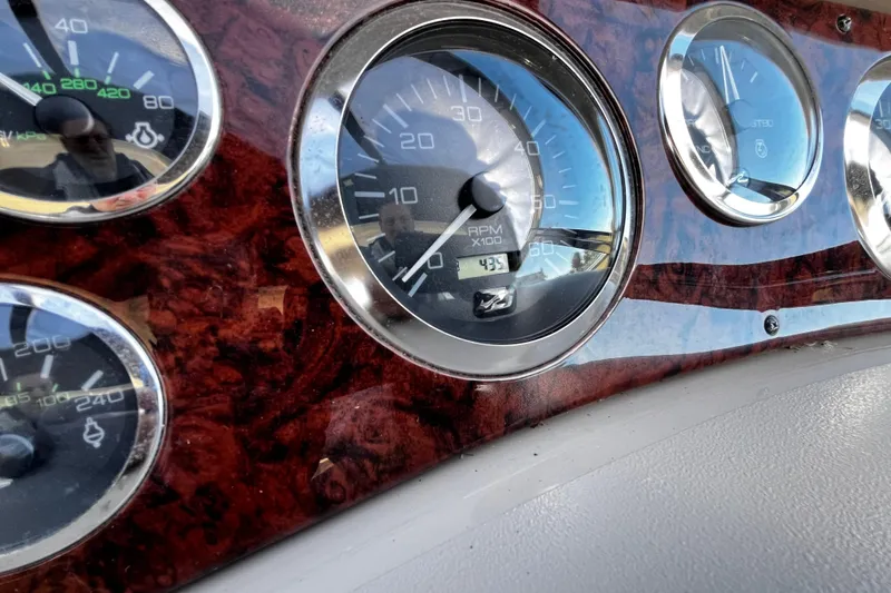 Slide: The Image of Close-up of 1999 Sea Ray 380 Sundancer dashboard gauges. - 15