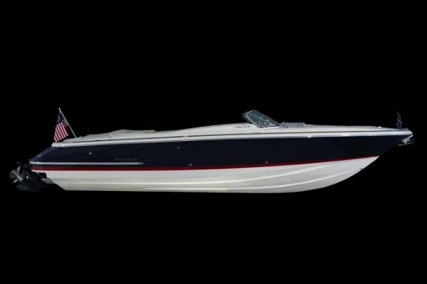 Slide: The Image of 2012 Chris-Craft Launch 28 boat cockpit with steering wheel and control panel. - 4