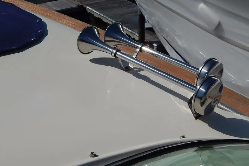 Slide: The Image of 2012 Chris-Craft Launch 28 boat with dual chrome horns on deck. - 8