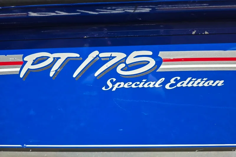 Slide: The Image of 2006 Tracker Pro Team 175 Special Edition boat decal on blue background. - 2