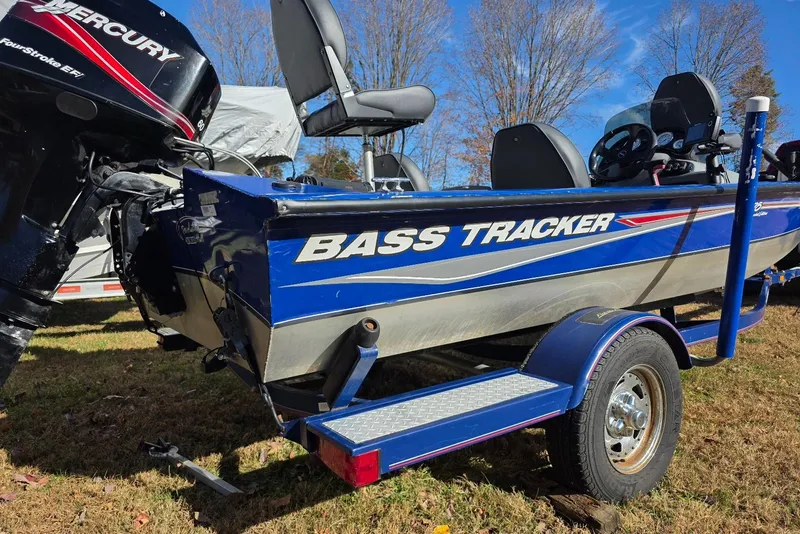 Slide: The Image of 2006 Tracker Pro Team 175 bass boat with Mercury engine on trailer. - 3