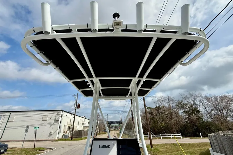 Slide: The Image of 2020 Blazer Bay 2420 GTS boat with T-top, street view, cloudy sky. - 11