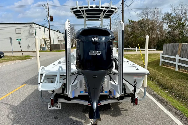 Slide: The Image of 2020 Blazer Bay 2420 GTS boat with Yamaha 250 engine on a street. - 3