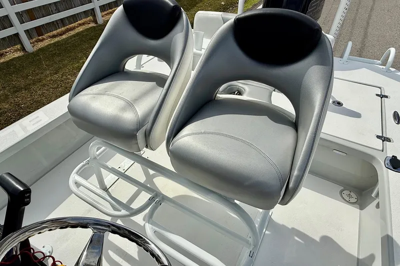 Slide: The Image of 2020 Blazer Bay 2420 GTS boat seats, featuring sleek gray design and comfortable seating. - 9