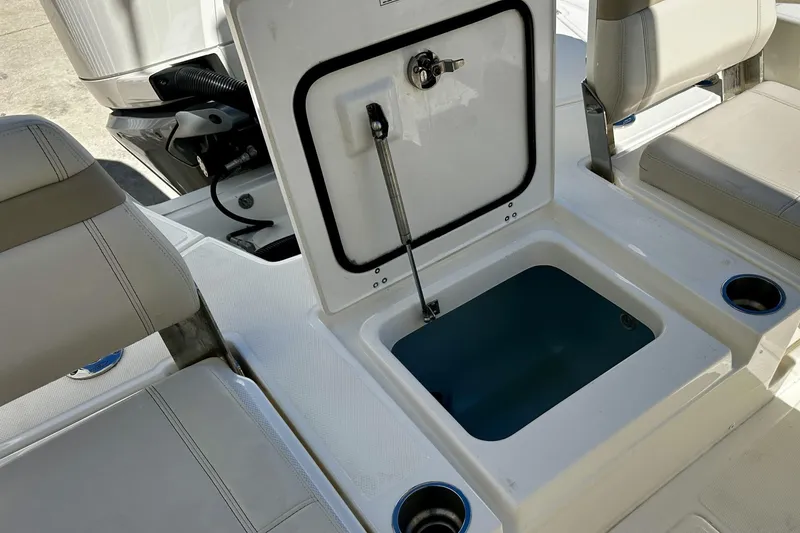 Slide: The Image of Boston Whaler 25 - Exterior Aft Storage - 16
