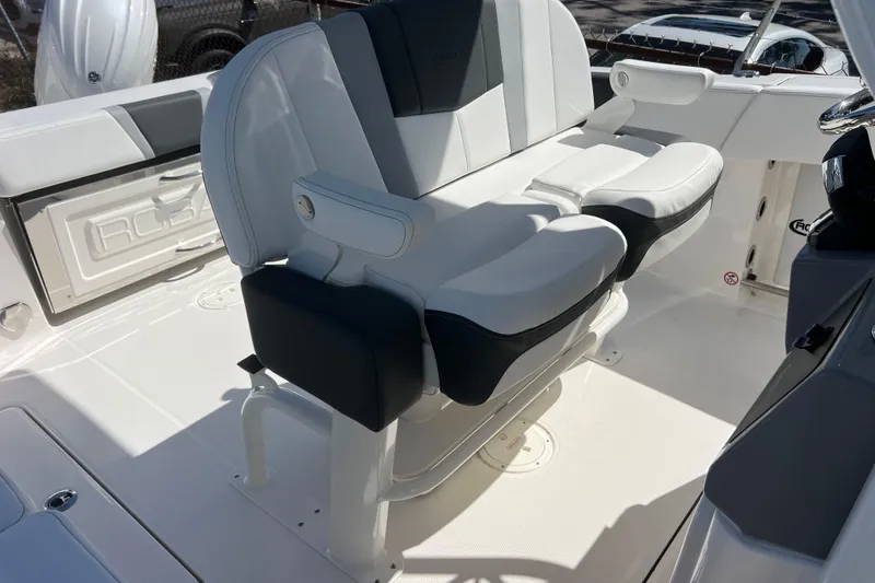 Slide: The Image of 2026 Robalo R250 Center Console boat interior with dual seating and sleek design. - 11