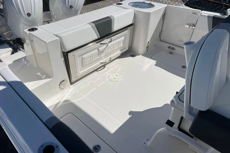 Slide: The Image of 2026 Robalo R250 Center Console boat interior with seating and storage. - 12