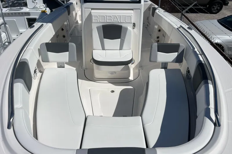Slide: The Image of 2026 Robalo R250 Center Console boat interior with spacious seating and modern design. - 8