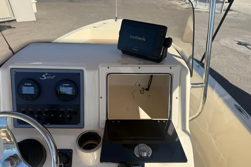 Slide: The Image of 2022 Scout 175 Sportfish dashboard with Garmin GPS and Yamaha gauges. - 11