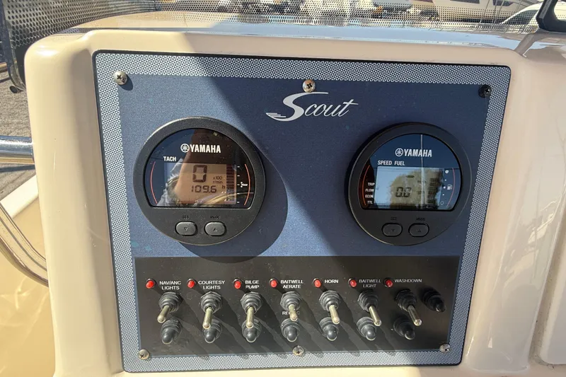 Slide: The Image of Control panel of 2022 Scout 175 Sportfish boat with Yamaha gauges and switches. - 12