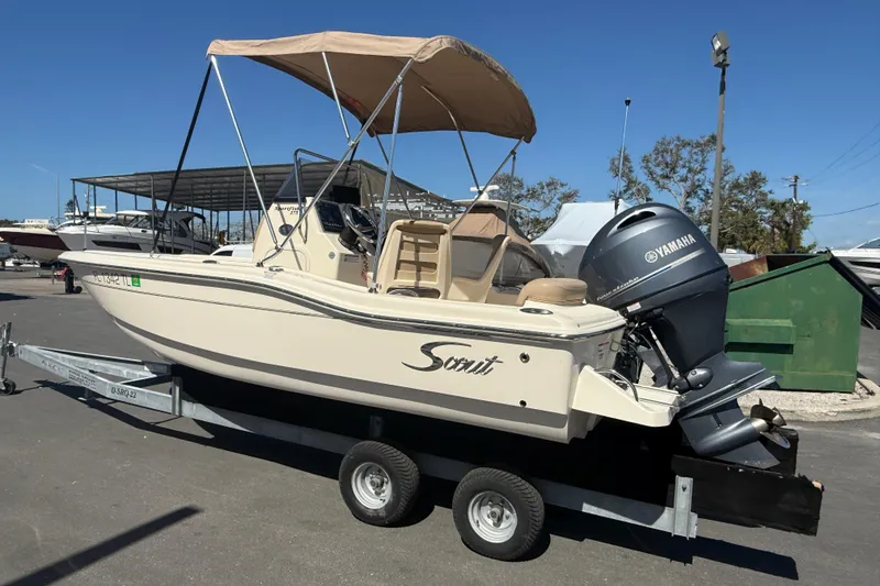 Slide: The Image of 2022 Scout 175 Sportfish boat on trailer with Yamaha outboard motor. - 5