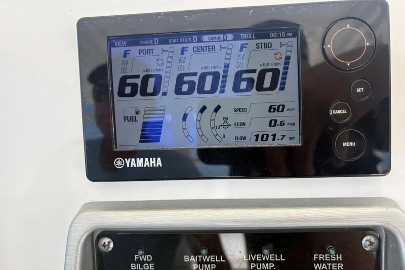 Slide: The Image of Yamaha display on 2015 Everglades 355 Center Console showing engine stats and fuel data. - 15