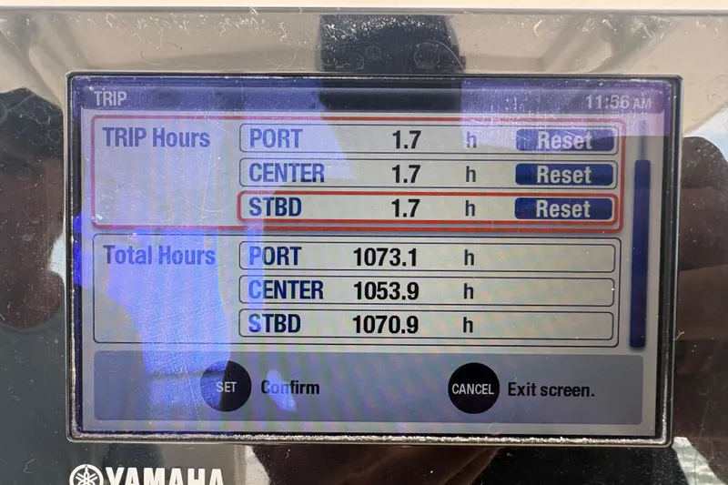 Slide: The Image of Display screen showing trip and total engine hours for Everglades 355 Center Console, 2015 model. - 16