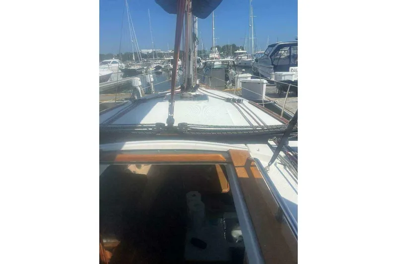 Slide: The Image of 2007 Jeanneau Sun Odyssey 39i sailboat docked at marina, view from deck. - 17