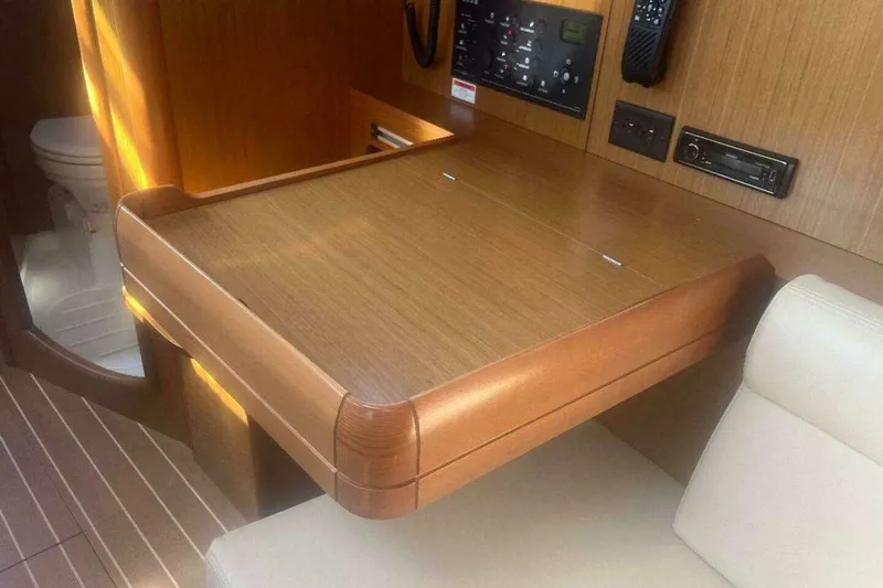 Slide: The Image of Interior of 2007 Jeanneau Sun Odyssey 39i yacht with navigation station and seating. - 28