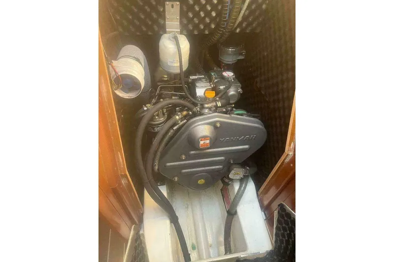 Slide: The Image of Engine compartment of 2007 Jeanneau Sun Odyssey 39i sailboat, featuring a Yanmar engine. - 35