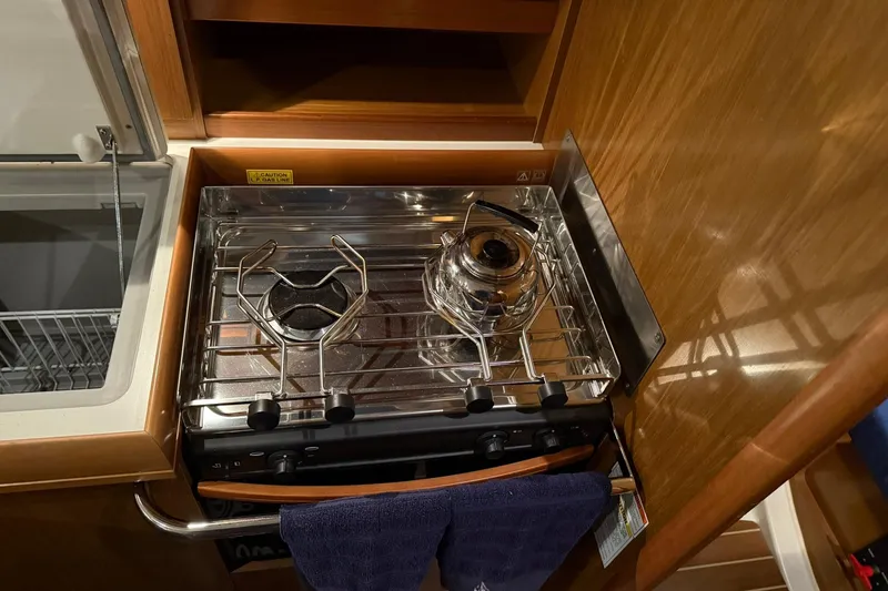Slide: The Image of Galley stove with kettle on Jeanneau Sun Odyssey 39i, 2007 model yacht. - 40