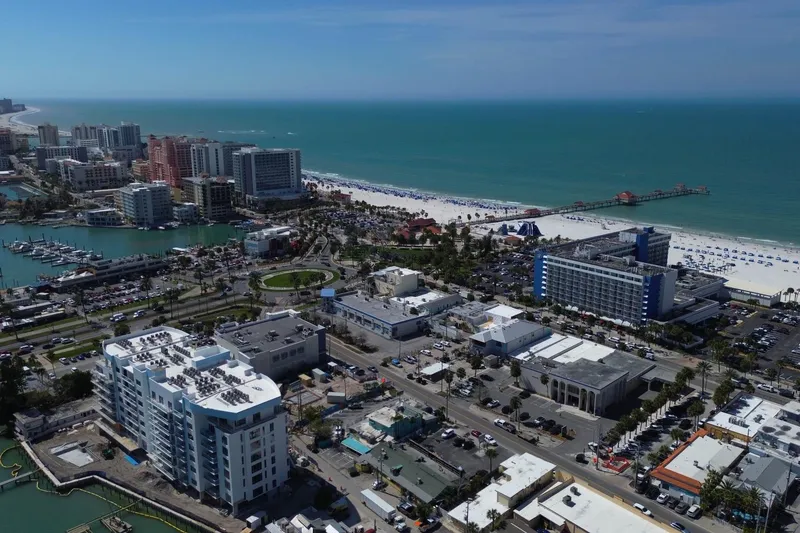 Slide: The Image of Aerial view of coastal cityscape with beach, pier, and marina. Mainship 40 Trawler, 2005. - 50