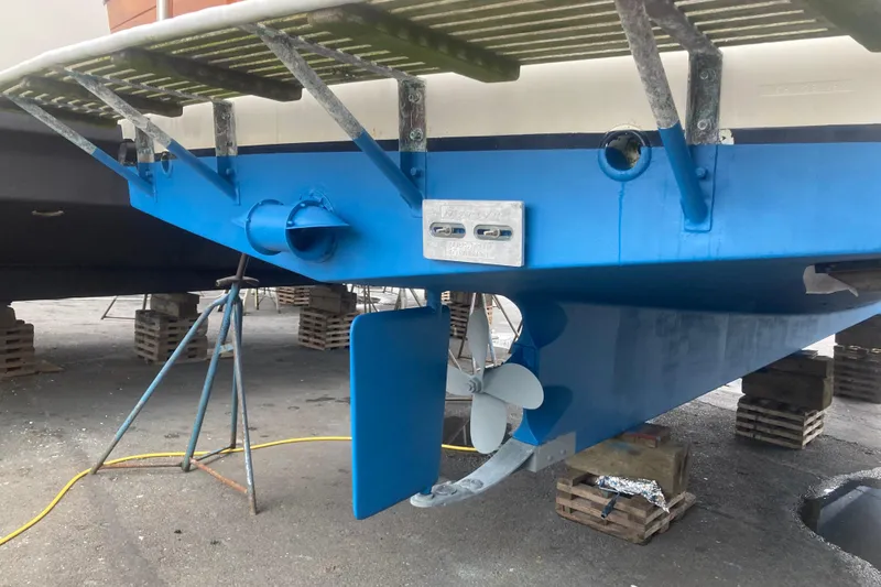Slide: The Image of 1983 Grand Banks 32 Sedan boat hull and propeller on dry dock. - 56
