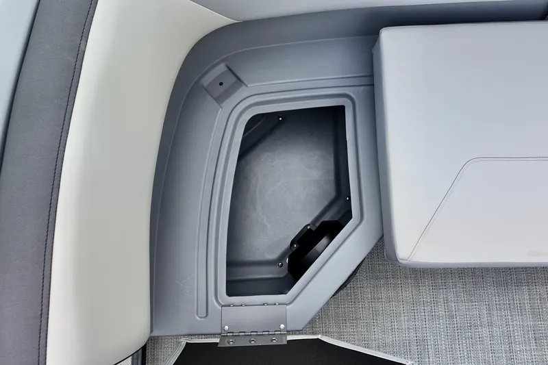 Slide: The Image of Storage compartment in 2026 Sylvan A-22 LZ DH SPORT boat interior. - 12