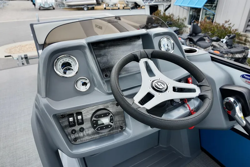Slide: The Image of Dashboard of 2026 Sylvan A-22 LZ DH SPORT boat with steering wheel and controls. - 20
