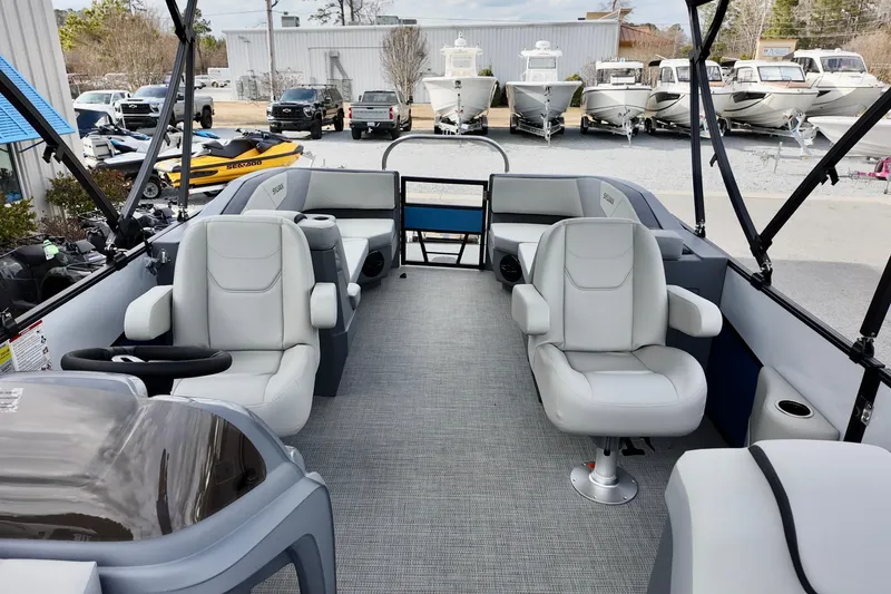 Slide: The Image of 2026 Sylvan A-22 LZ DH SPORT boat interior with plush seating and modern design. - 9