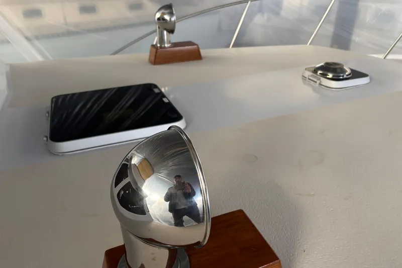 Slide: The Image of Close-up of 1987 Wilbur 38 yacht deck with chrome fittings and reflections. - 34