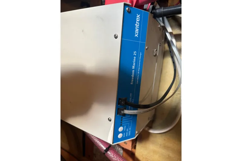 Slide: The Image of Xantrex Freedom Marine 25 inverter charger in a 1987 Wilbur 38 boat. - 43