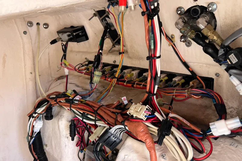 Slide: The Image of Wiring and components inside a 1999 Grady-White Escape 209 boat. - 36