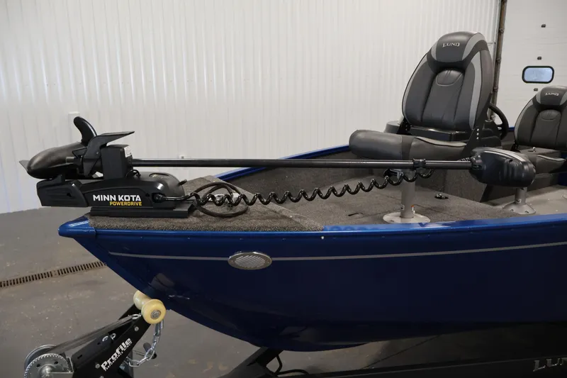Slide: The Image of 2021 Lund 1650 Angler Sport boat with Minn Kota PowerDrive trolling motor. - 11