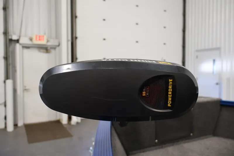 Slide: The Image of Minn Kota PowerDrive motor on 2021 Lund 1650 Angler Sport boat in a garage. - 12