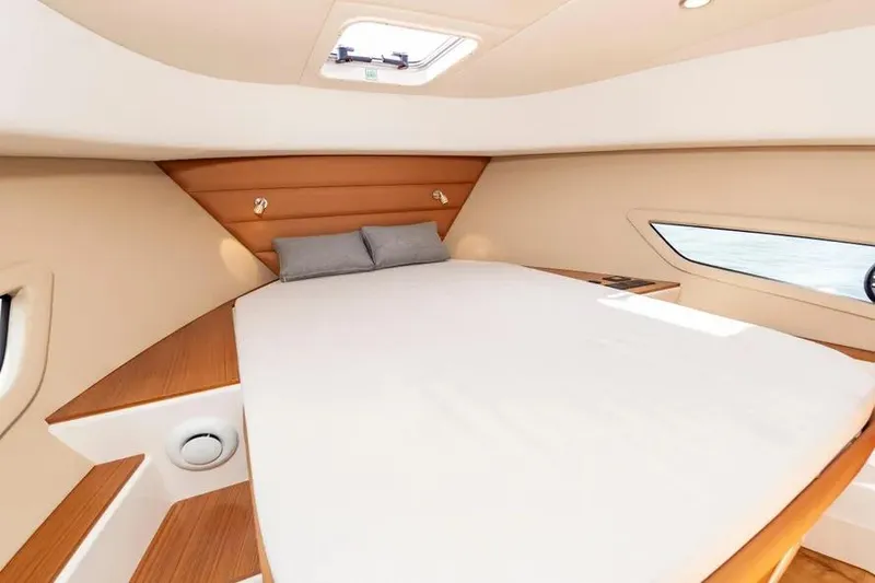 Slide: The Image of Luxurious cabin interior of 2023 Pescador 35 yacht with cozy bed and modern design. - 39