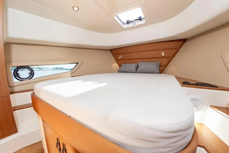 Slide: The Image of Luxurious cabin interior of 2023 Pescador 35 yacht with cozy bed and modern design. - 40