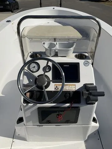 Slide: The Image of Console of a 2018 Sportsman 19 Island Reef boat. - 10