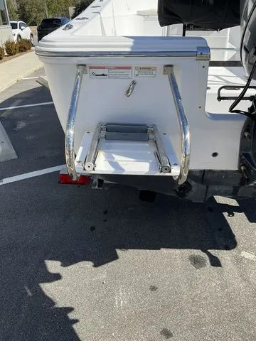 Slide: The Image of 2018 Sportsman 19 Island Reef boat with swim ladder. - 12