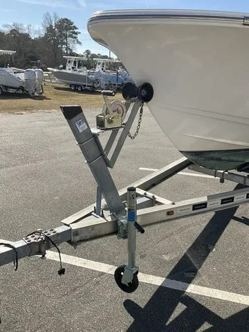 Slide: The Image of 2018 Sportsman 19 Island Reef boat parked on trailer. - 15