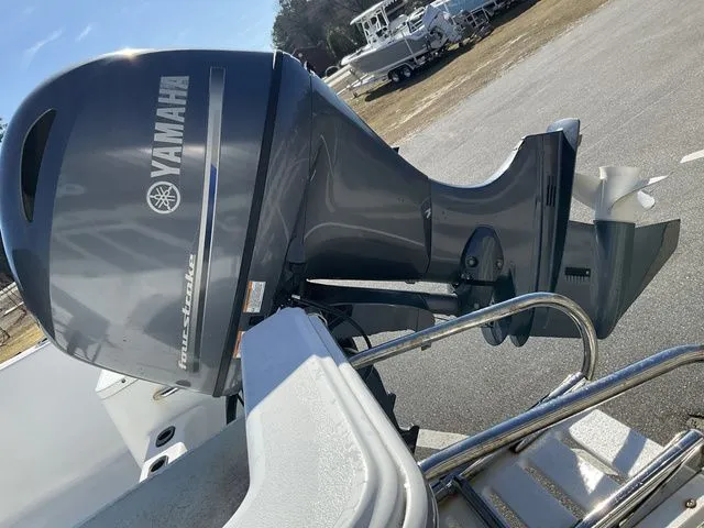 Slide: The Image of Yamaha outboard motor on a 2018 Sportsman 19 Island Reef boat. - 6