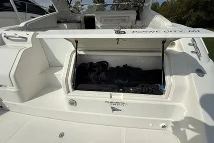 Slide: The Image of 2004 Regal Commodore 3260 boat storage compartment open - 7