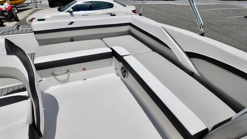 Slide: The Image of 2026 Starcraft SVX 191 OB boat interior with sleek white and black seating. - 14