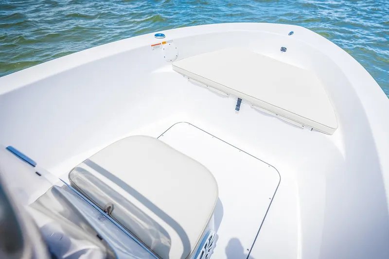 Slide: The Image of Manufacturer Provided Image: 2018 Sportsman Island Reef 17 Center Console boat interior, featuring seating and storage. - 2