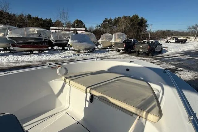 Slide: The Image of 2018 Sportsman Island Reef 17 Center Console boat in snowy storage lot. - 8