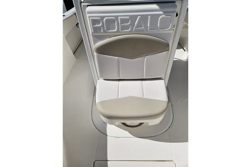 Slide: The Image of 2017 Robalo R242 Center Console boat seat with embossed logo. - 23