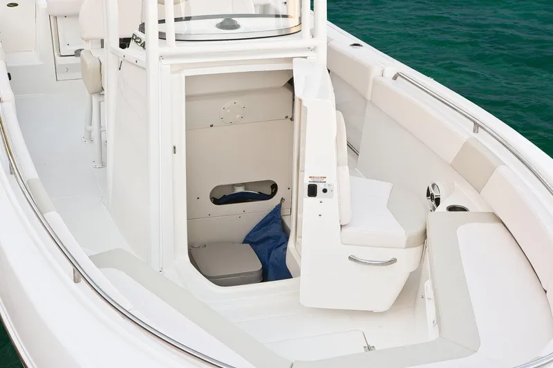 Slide: The Image of Manufacturer Provided Image: 2017 Robalo R242 Center Console boat interior with storage compartment. - 5