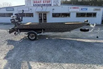 The Image of 2026 Gator Tail 1854 Extreme boat on trailer outside dealership. - 1