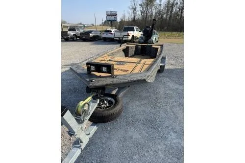 Slide: The Image of 2026 Gator Tail 1854 Extreme boat on trailer in parking lot. - 12