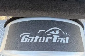 Slide: The Image of 2026 Gator Tail 1854 Extreme logo on textured surface. - 13